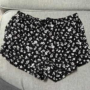 Garage womens size XS black shorts with white flowers and pockets!!